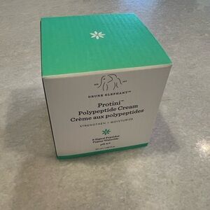 Drunk Elephant Protini Cream in Green and White